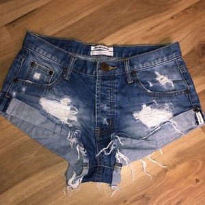 One teaspoon distressed cutoff denim shorts. Worn